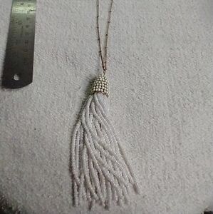 Very long goldtone chain white beaded dangle pendant necklace
